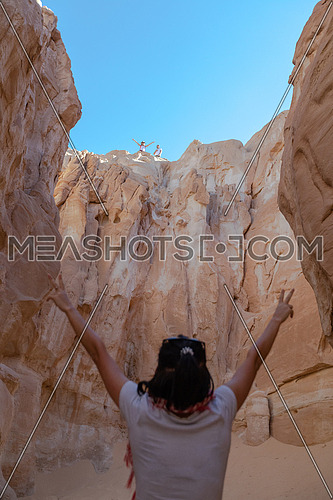 Female Tourist inside Makhroum Mountain in Sinai Trail by day