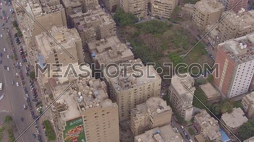 Fly Over top shot for Al Mohandseen area revealing Moustafa Mahmoud Square 22th of March 2018 in Giza  at day
