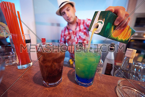 professional  barman prepare fresh coctail drink and representing nightlife and party event concept