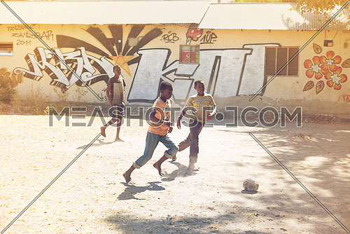 african kids playing  Football in Nungwi