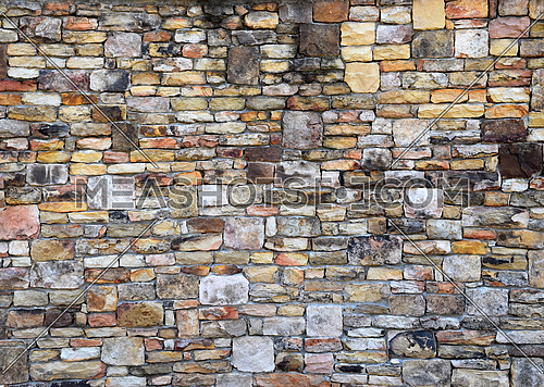 Closeup Texture Background Image of Natural rock or Stone arrange in Pattern as Wall. Natural Stone Wall Texture.