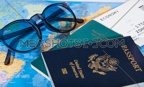 american passport and egyptian passport on map travel concept