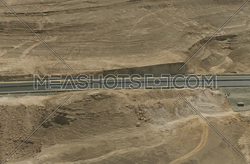Arial shot form Helicopter for raod in the desert in Suez at day