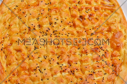 Homemade traditional Turkish meal pide stuffed with meat cheese,  and sauce isolated on white background