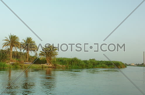 camera movement shot by the river nile and green islands