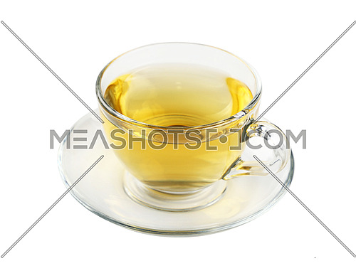 Close up one transparent glass cup of green oolong or herbal tea on saucer isolated on white background, high angle view