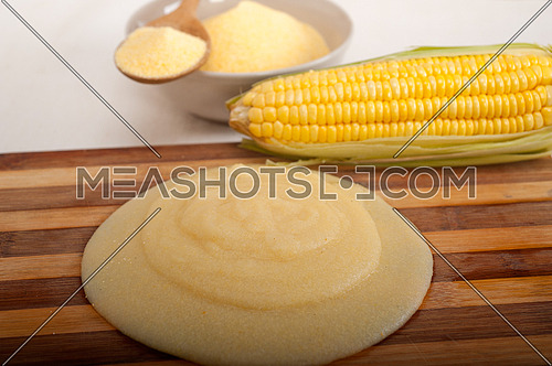 polenta traditional north Italy corn maize flour cream with cob