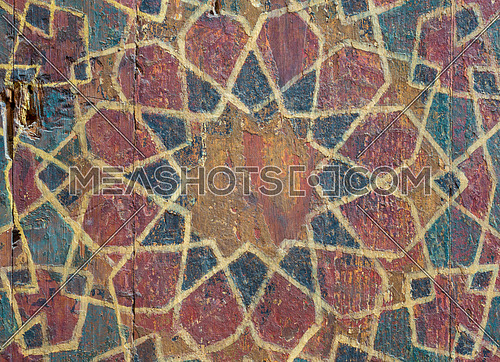 Closeup of ornaments of a wooden cupboard painted with colored geometrical patterns, Sultan al Ghuri Mausoleum, Cairo, Egypt