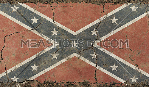 Old grunge vintage dirty faded shabby distressed American US Confederate South historical flag background on broken concrete wall with cracks