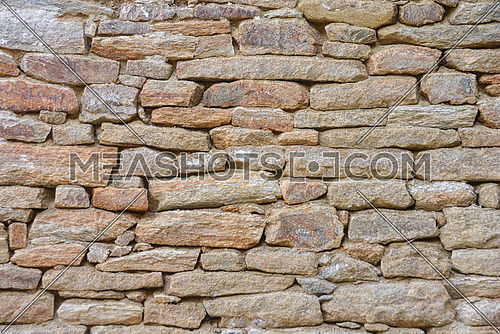 Background texture of stone wall. Natural stone, a wall of natural stone.