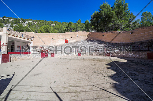 Alcala del Jucar, Spain - October 29, 2016: Ancient bullring, this square is constructed in the shape of ship and byline of the year 1902, next to the banks of the river Jucar, take in Alcala of the Jucar, Albacete province, Spain