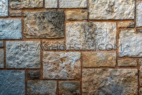 Closeup Texture Background Image of Natural rock or Stone arrange in Pattern as Wall. Natural Stone Wall Texture.