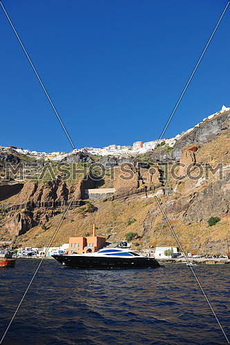 greece santorini island coast with luxury yacht