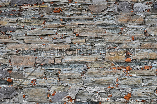 Old style rough stone rock wall texture