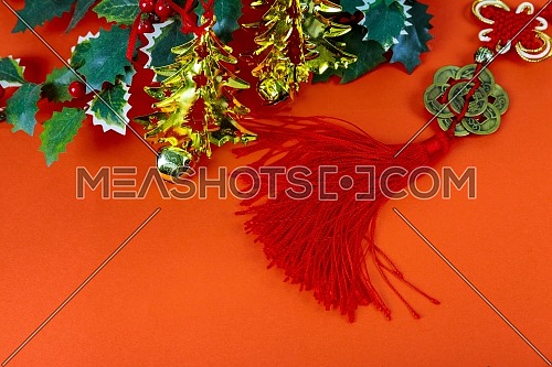 Happy Chinese New Year with traditional decorations on red background fabric with text and sign.