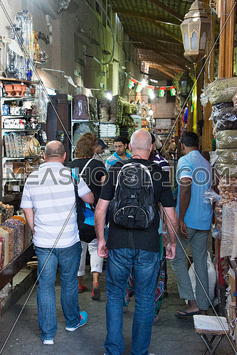 tourists walking in an old grand bazar