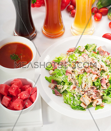 fresh classic caesar salad with red and blonde beer on background ,healthy meal ,MORE DELICIOUS FOOD ON PORTFOLIO