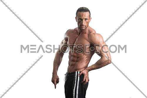 Muscular Mature Man Posing In Studio - Isolated On White Background