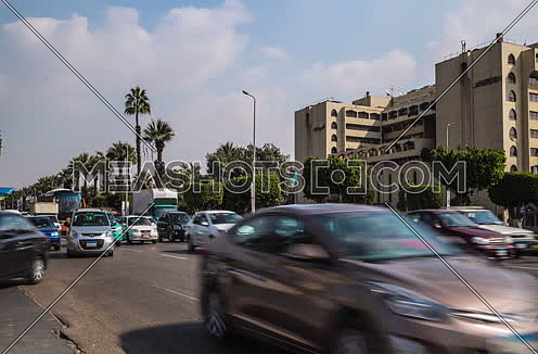 Zoom Out Shot for traffic at Salah Salim Street showing Le Meridien Hotel in background at Daytime