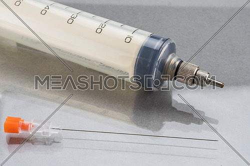 Syringe for neurosurgery cervical percutaneous automated, conceptual image