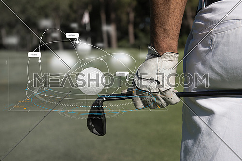 Golf equipment, golf ball with tee on course and stick