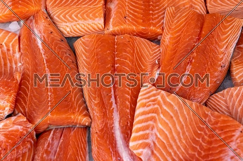 Raw Salmon Fillets on Ice for Sale at Market