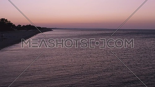Aerial view of beautiful mediterranean sea and beach at sunrise, seascape of Calabria,  Simeri Mare, Southern Italy
