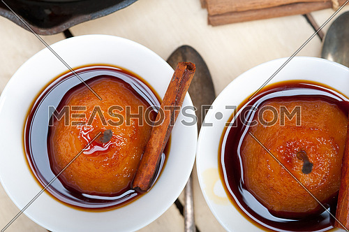 poached pears delicious home made recipe ove white  rustic wood table