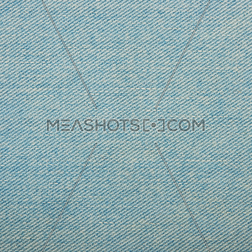 Light blue washed cotton jeans denim texture background, close up