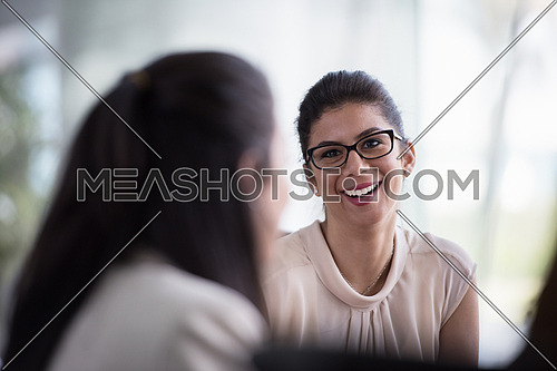 portrait of middle eastern business woman as leader  on meeting at modern office interior