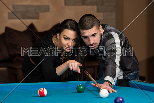 Young Caucasian Man Receiving Advice On Shooting Pool Ball While Playing Billiards