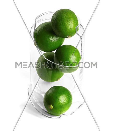 shattered glass jar with lime on white background