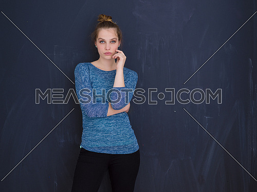 portrait of Beautiful young woman isolated on grey background