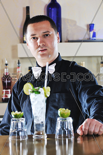 pro barman prepare coctail drink and representing nightlife and party event  concept
