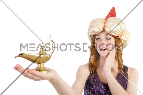 Pretty girl holding magic lamp isolated on white