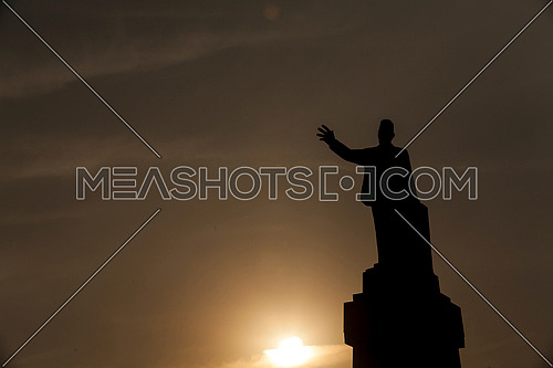 Long Sillhout Shot for Saad Zaghloul Statue at Cairo from Day to Sunset