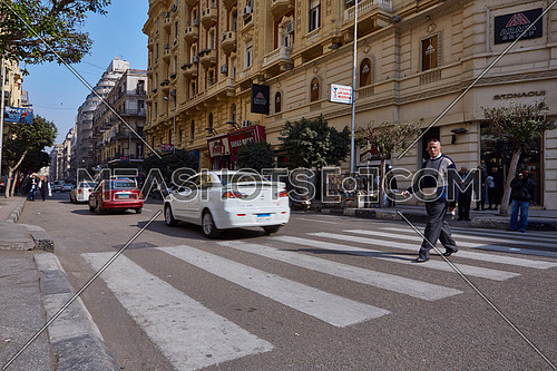 Long shot for pedestrain crossing Sherif Basha Street at cairo at Day