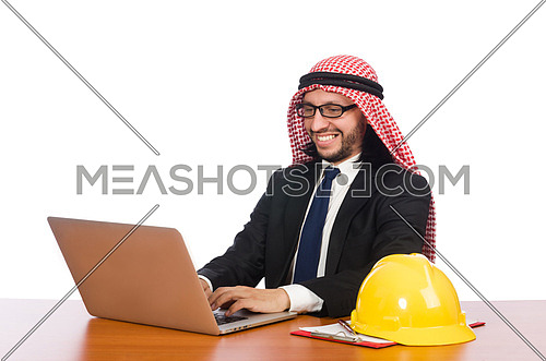 Arab man with computer and hardhat