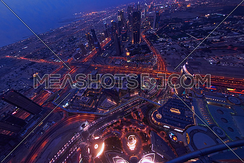 Dubai night skyline. Dubai streets by night. Al Yaqoub tower Dubai. Dubai Millennium Plaza. Dubai Sheikh Zayed Road by night. Dubai night view. Dubai cityscape by night. Dubai metro station view.