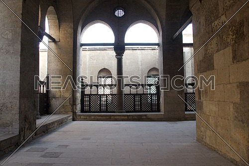 a photo from inside a historical mosque in Islamic Cairo, Egypt showing  architecture  style used at that time