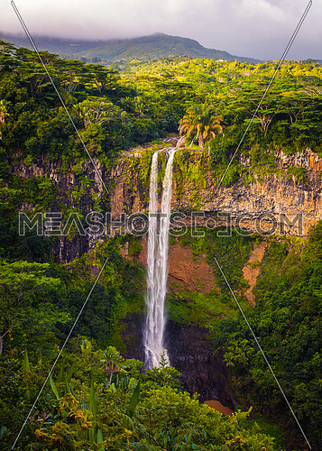 Amazing panorama of waterfall Chamarel seven coloured earths and jungle around it, Mauritius.