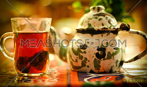 Tea pot & a glass of tea