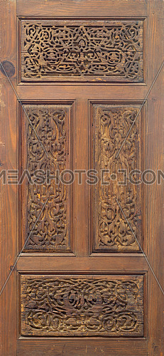Arabesque floral engraved patterns of Fatimid style wooden ornate door leaf, Cairo, Egypt