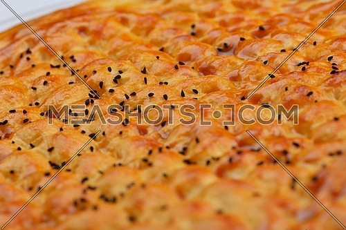 Homemade traditional Turkish meal pide stuffed with meat cheese,  and sauce isolated on white background
