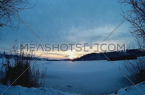 Sunset At The Frozen Lake
