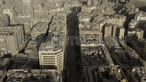 revealing shot flying over downtown streets
