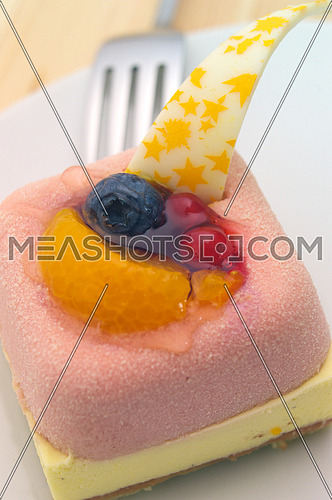 fresh berry fruit cream cake pastry closeup
